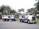 Mack truck and dog trailer