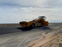 Aggregate loader forward ejecting trucks