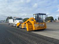 Aggregate spreader vehicles