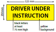 Yellow rectangle with the words Driver Under Instruction in black lettering