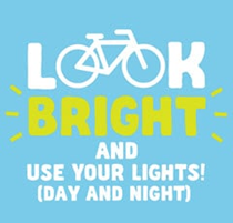 sign saying Look bright and use your light! (Day and night)