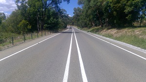 Picture of a road with two continuous centre lines.