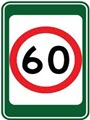 60km sign with a green and white background smaller
