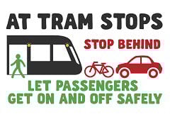 Stay behind trams when passengers getting on and off