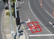 Image showing grid outlining a traffic detector at an intersection