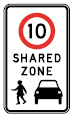 road sign showing drivers to be cautious as this is a shared zone between pedestrians and cars
