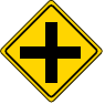 road sign alterts drivers to cross road head