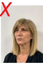 Unsuitable licence photo: person is facing to the side, instead of facing the camera