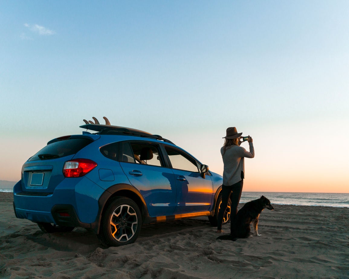 An SUV parked on a beach.  Find out how to convert your overseas or interstate licence to a Victorian licence.