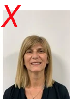 Unsuitable licence photo: person's mouth is open and smiling