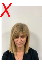 Unsuitable licence photo: person is not looking at the camera