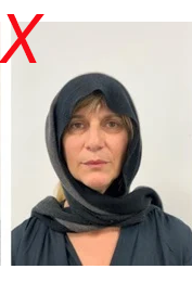 Unsuitable use of head covering in licence photo: covering casts shadows across the head