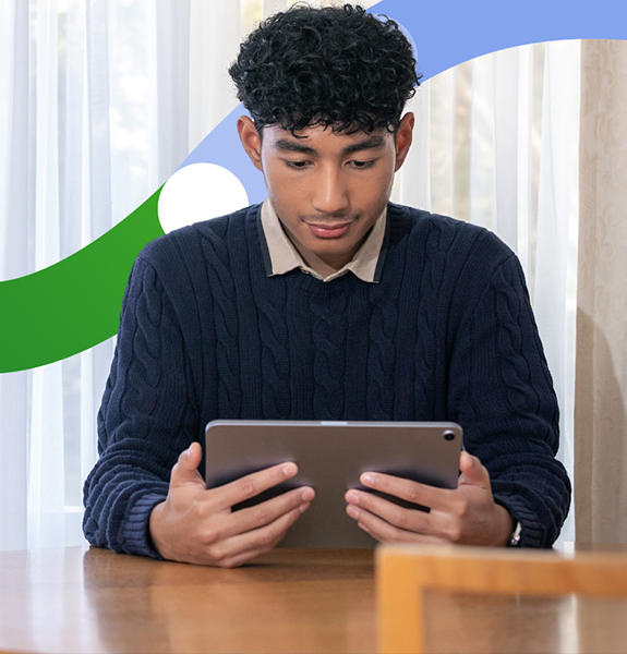 Young male student studies for his learner permit test.